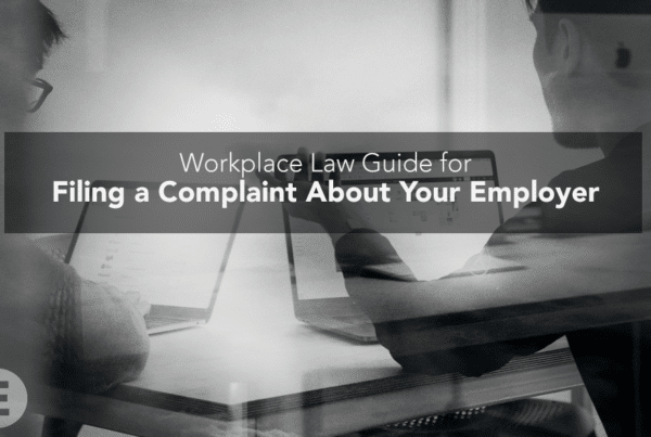 frustrated employee discussing with workmate Executive Legal workplace law guide for filing a complaint about employers